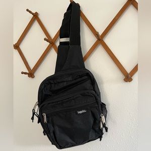 Baggalini Sling Travel Bag In Black Nylon